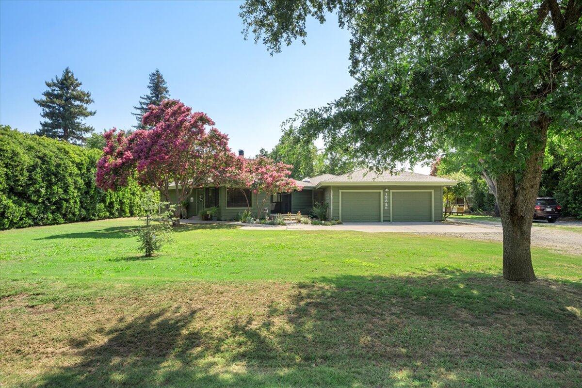 12325 Craig Avenue Red Bluff, CA 96080 - Photo 1 of 68 a view of a house with a yard