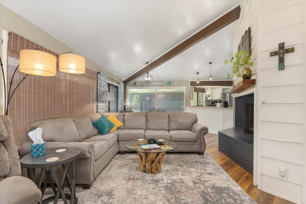 12325 Craig Avenue Red Bluff, CA 96080 - Photo 15 of 68 a living room with furniture and a fireplace