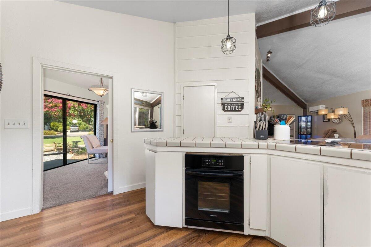 12325 Craig Avenue Red Bluff, CA 96080 - Photo 22 of 68 a kitchen with stainless steel appliances granite countertop a stove and a sink