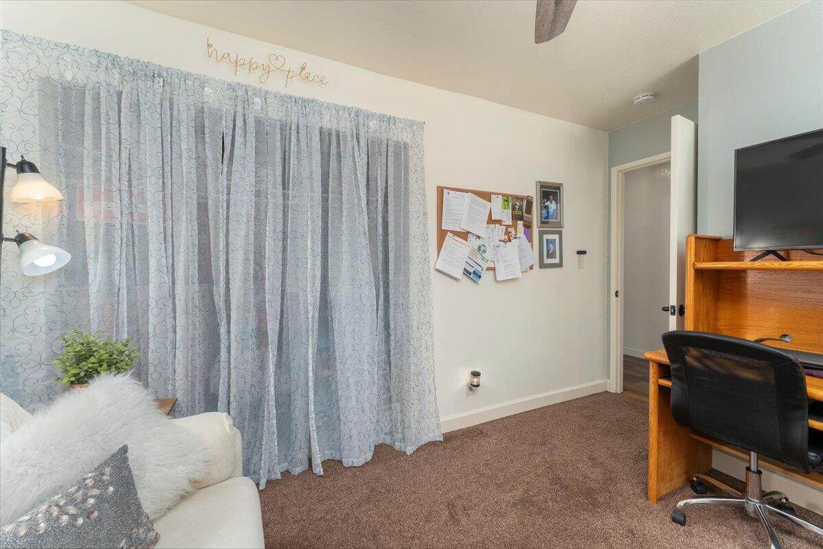 12325 Craig Avenue Red Bluff, CA 96080 - Photo 32 of 68 a bedroom with a bed and a television