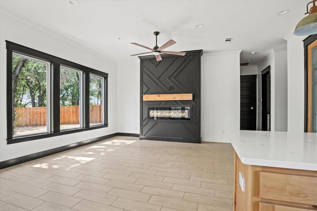 1791 JE Woody Road Springtown, TX 76082 - Photo 9 of 33 a view of a room with a sink and window