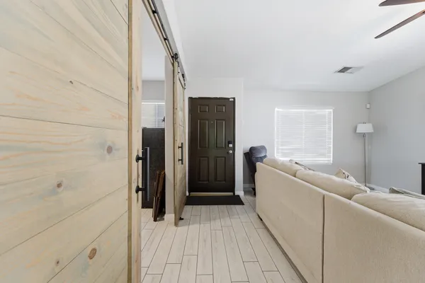 a view of a dining room with furniture window and outside view