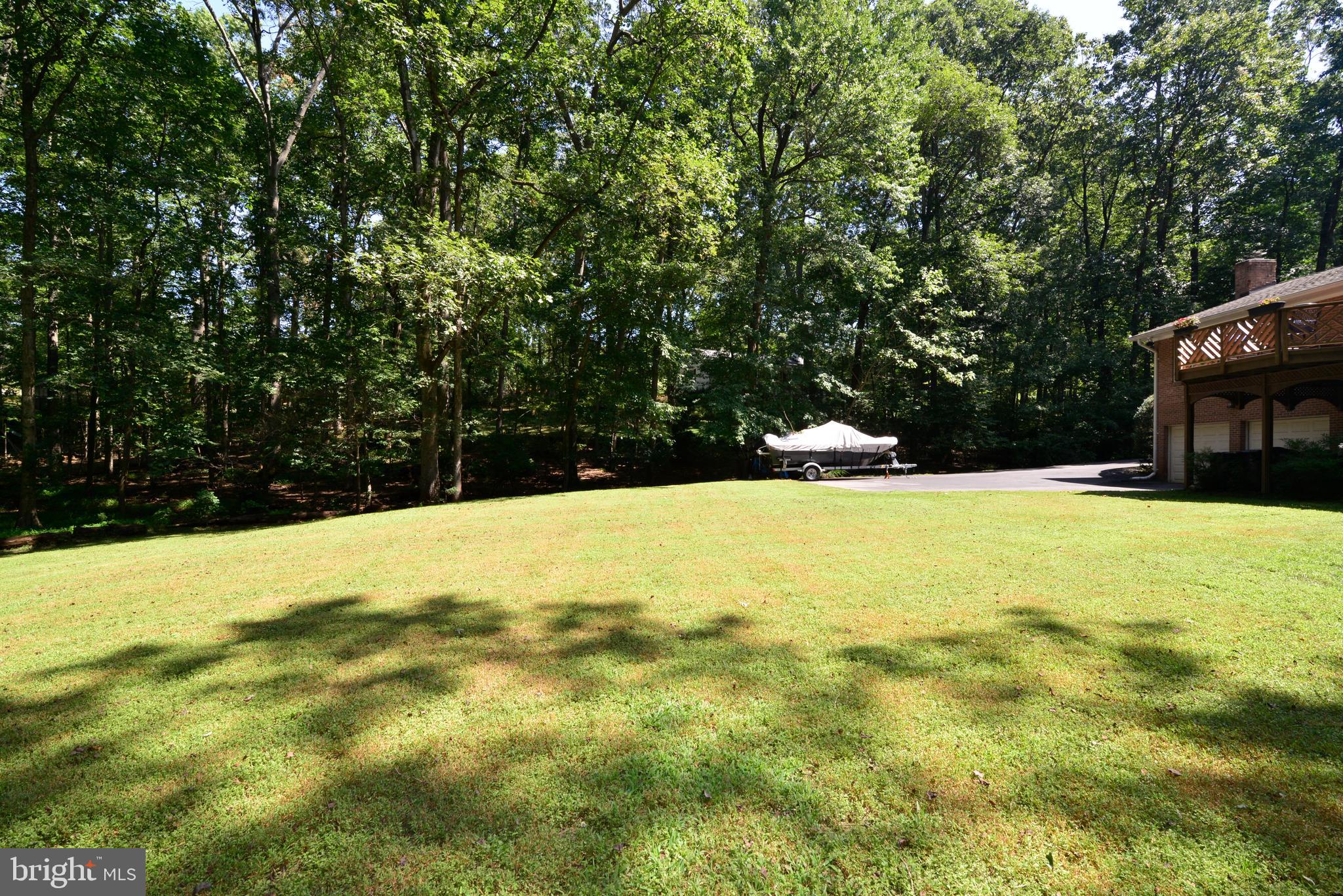 1700 Besley Road Vienna, VA 22182 - Photo 45 of 53 view of back of house from side rear yard