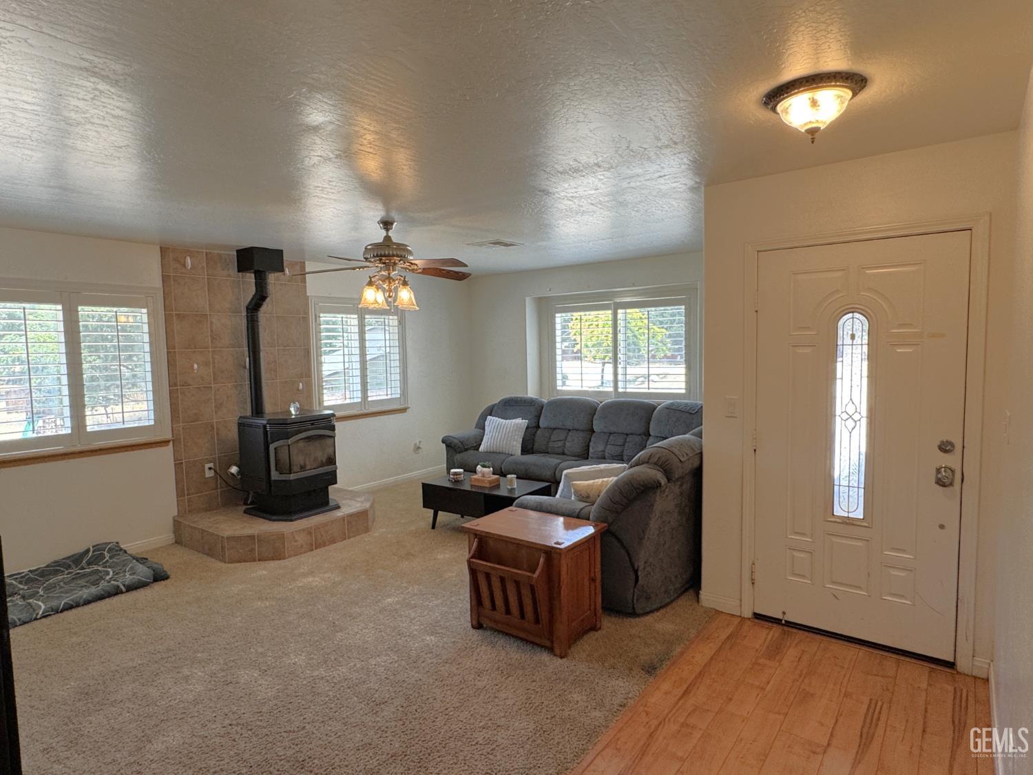 Undisclosed Address Tehachapi, CA 93561 - Photo 3 of 16 a living room with furniture and wooden floor