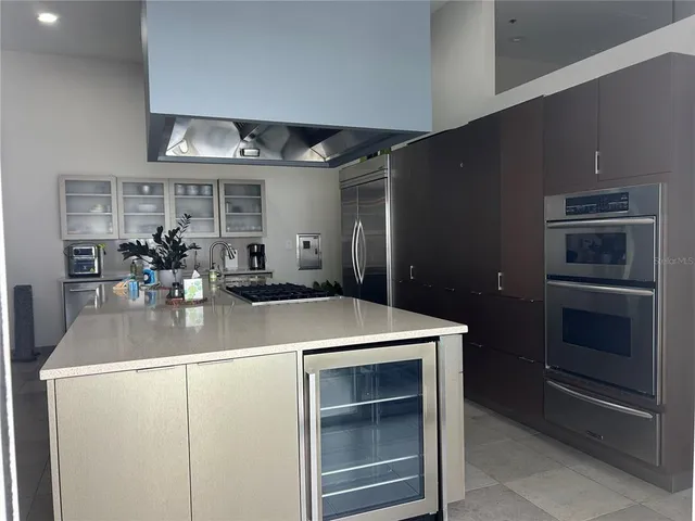 a kitchen with a sink and cabinets