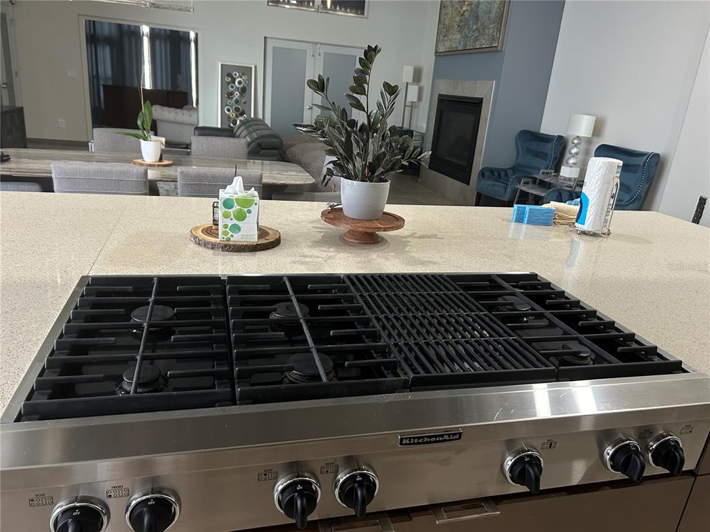 1345 2nd Street, Unit C Sarasota, FL 34236 - Photo 18 of 56 a close view of a stove a microwave and cabinets