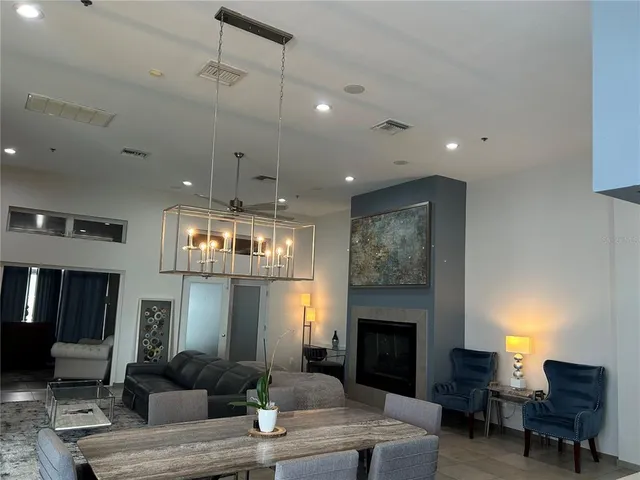 a bedroom with a bed and a chair