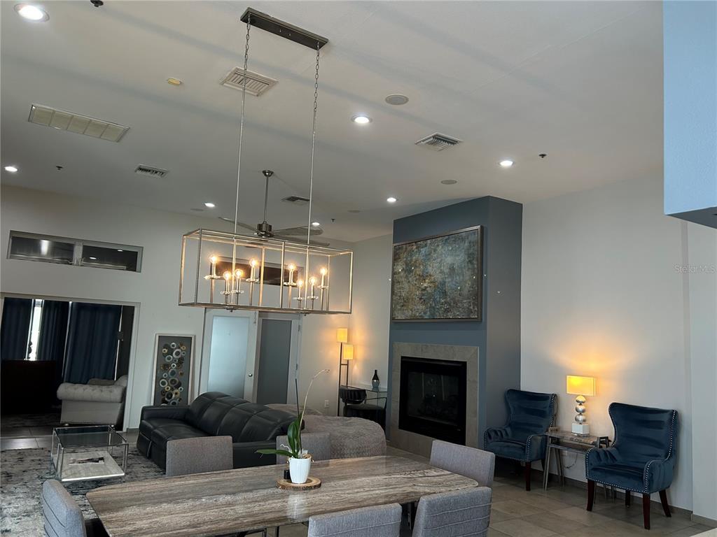 1345 2nd Street, Unit C Sarasota, FL 34236 - Photo 23 of 56 a living room with furniture and a fireplace