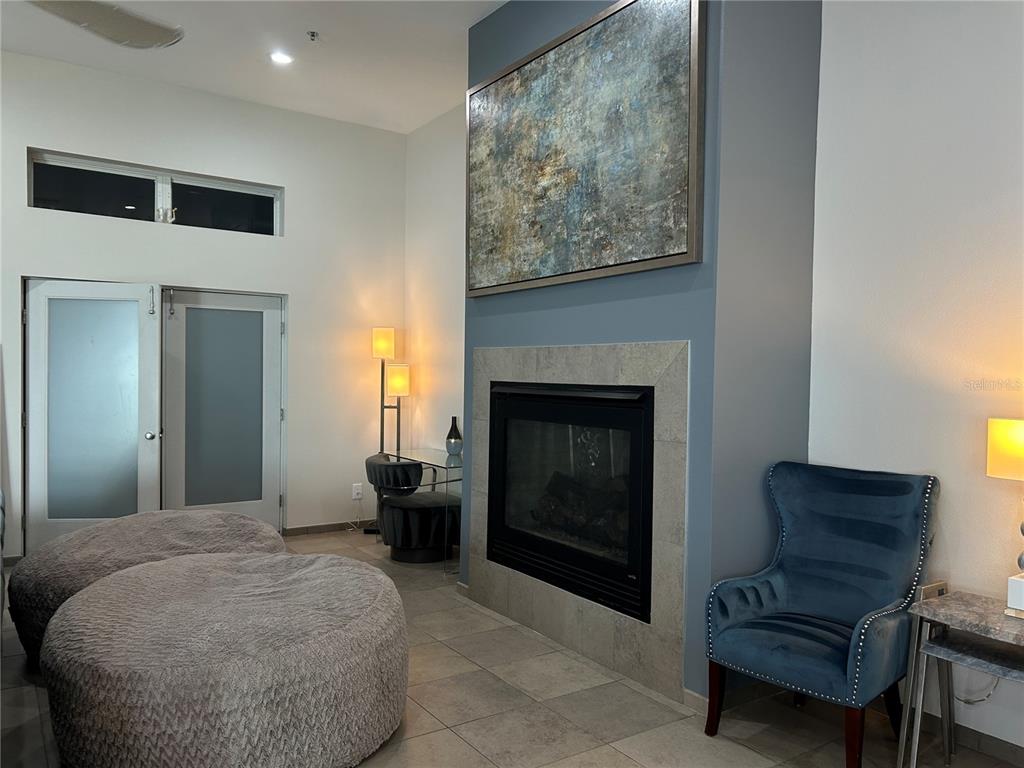 1345 2nd Street, Unit C Sarasota, FL 34236 - Photo 25 of 56 a bedroom with a bed and a couch