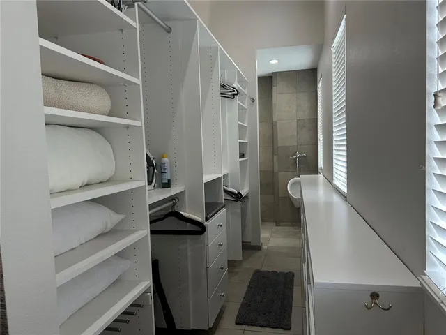 a bathroom with a shower and toilet