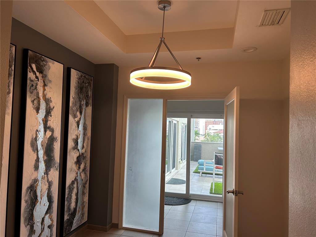 1345 2nd Street, Unit C Sarasota, FL 34236 - Photo 4 of 56 a view of a hallway to a livingroom with furniture