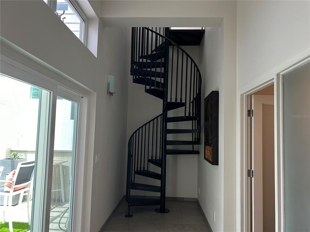 1345 2nd Street, Unit C Sarasota, FL 34236 - Photo 5 of 56 a view of entryway and hall with wooden floor