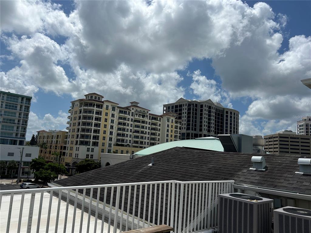1345 2nd Street, Unit C Sarasota, FL 34236 - Photo 52 of 56 a view of a balcony with city view