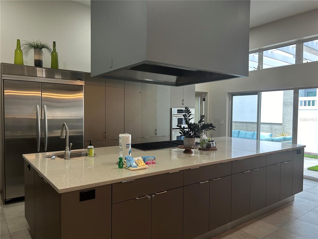 1345 2nd Street, Unit C Sarasota, FL 34236 - Photo 7 of 56 a bathroom with a sink and a mirror