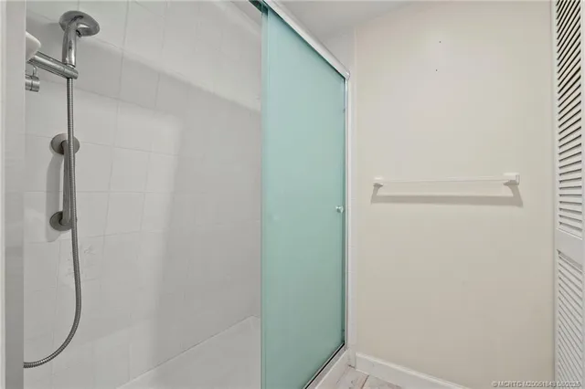 a bathroom with a sink vanity and a mirror
