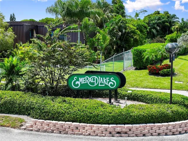 an aerial view of a house with a swimming pool