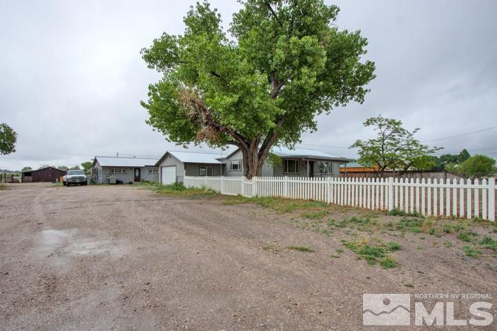 3910 Schindler Road Fallon, NV 89406 - Photo 1 of 1 a front view of a house with a yard