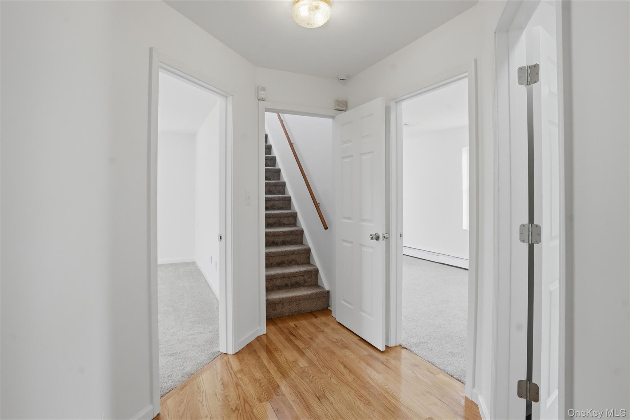 160 Pirog Road Pine Bush, NY 12566 - Photo 30 of 50 a view of a hallway with wooden floor and entryway