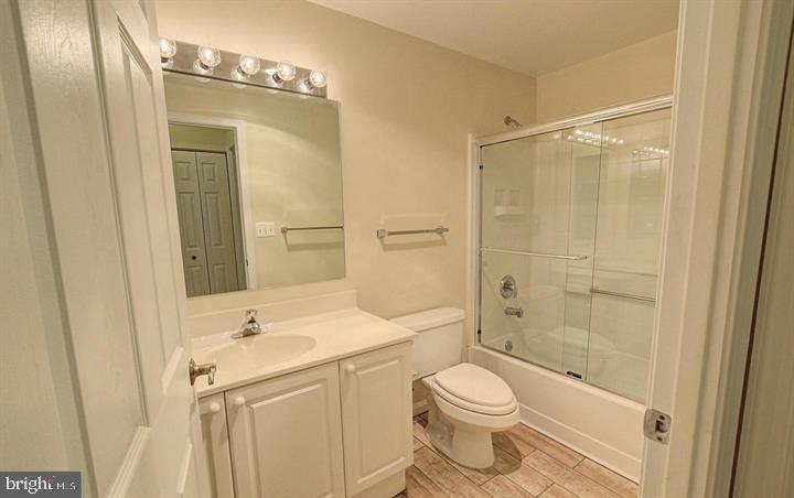 3200 North Leisure World Boulevard, Unit 203 Silver Spring, MD 20906 - Photo 15 of 32 a bathroom with a sink toilet and shower
