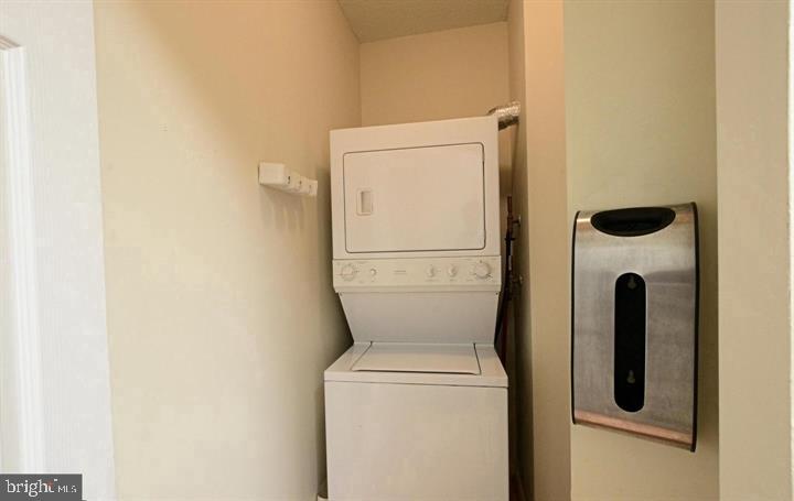 3200 North Leisure World Boulevard, Unit 203 Silver Spring, MD 20906 - Photo 16 of 32 a utility room with dryer and washer