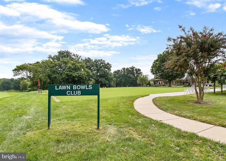 3200 North Leisure World Boulevard, Unit 203 Silver Spring, MD 20906 - Photo 29 of 32 a view of a golf course with a tree