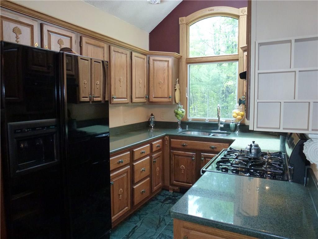 1215 Beech Ridge Road North Berwick, ME 03906 - Photo 14 of 33 Kitchen has marble floors and quartz...