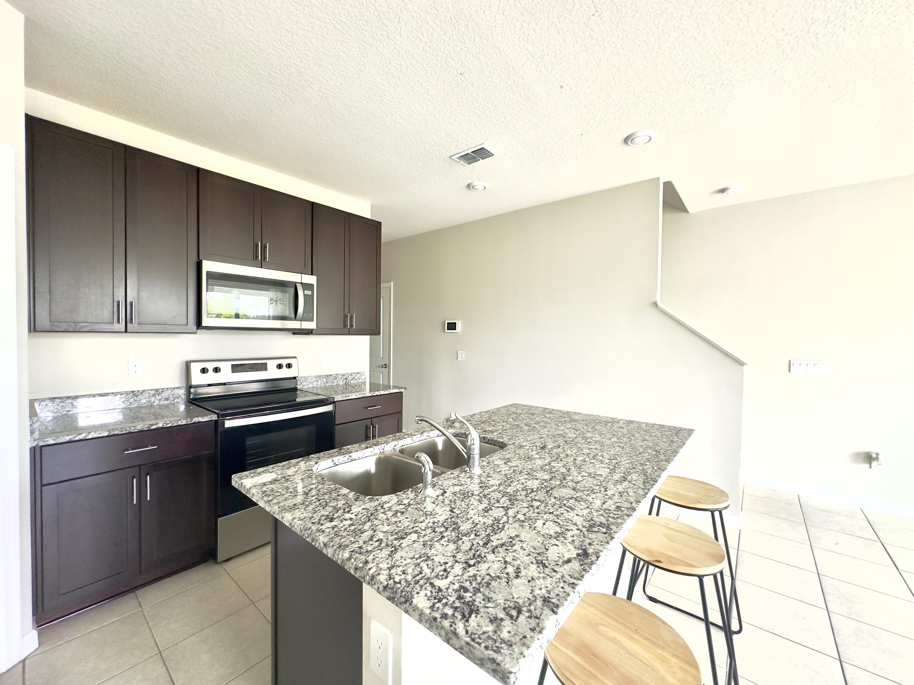 3922 Southeast Caladium Court, Unit 3922 Stuart, FL 34997 - Photo 6 of 54 IMG_0410