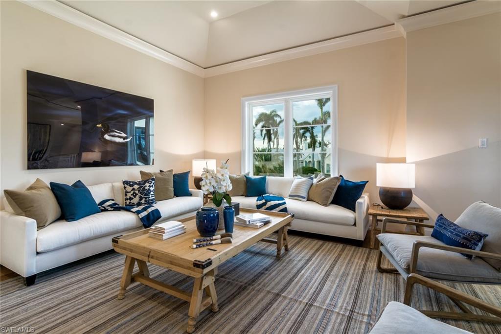 870 Nelson`s Walk Naples, FL 34102 - Photo 18 of 24 a living room with furniture and a wooden floor