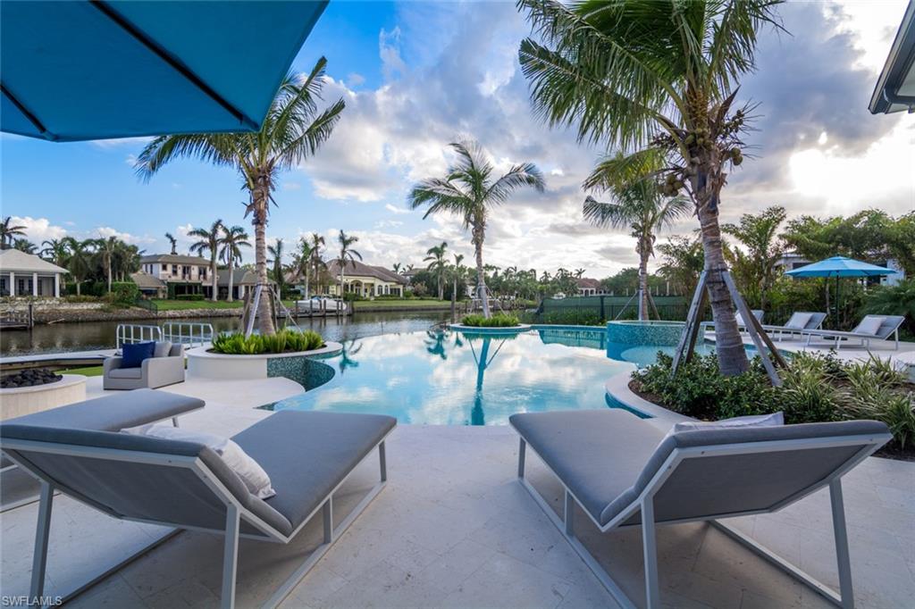 870 Nelson`s Walk Naples, FL 34102 - Photo 24 of 24 a view of a patio with swimming pool