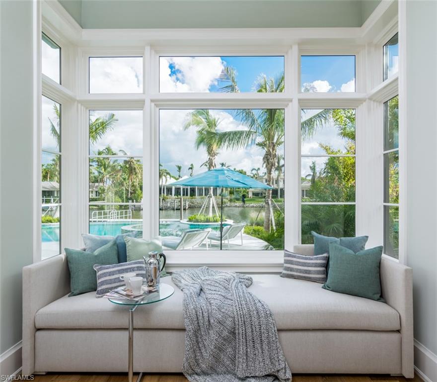 870 Nelson`s Walk Naples, FL 34102 - Photo 10 of 24 a living room with furniture and a large window