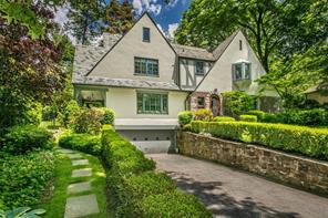61 Drake Road Scarsdale, NY 10583 - Photo 1 of 1 a front view of a house with a yard