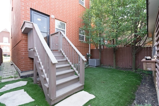 4152 South Berkeley Avenue Chicago, IL 60653 - Photo 15 of 15 a view of a house with a yard
