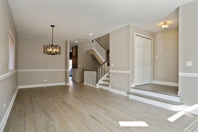4152 South Berkeley Avenue Chicago, IL 60653 - Photo 3 of 15 a view of an entryway with wooden floor
