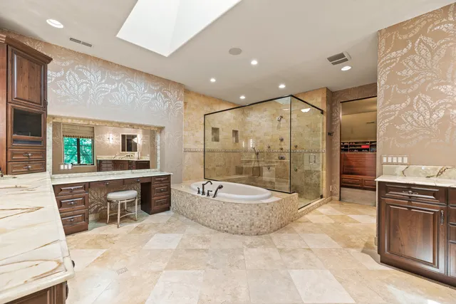 a kitchen with stainless steel appliances a sink and cabinets