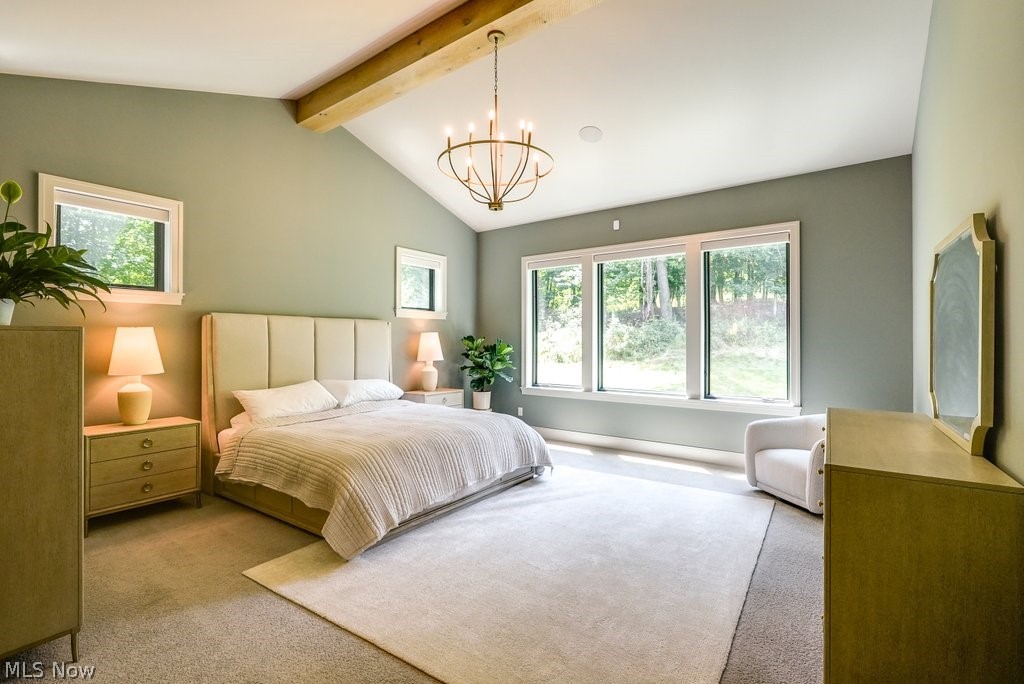 3040 Lander Road Pepper Pike, OH 44124 - Photo 14 of 38 Bedroom featuring carpet flooring, lofted ceiling with beams, and an inviting chandelier