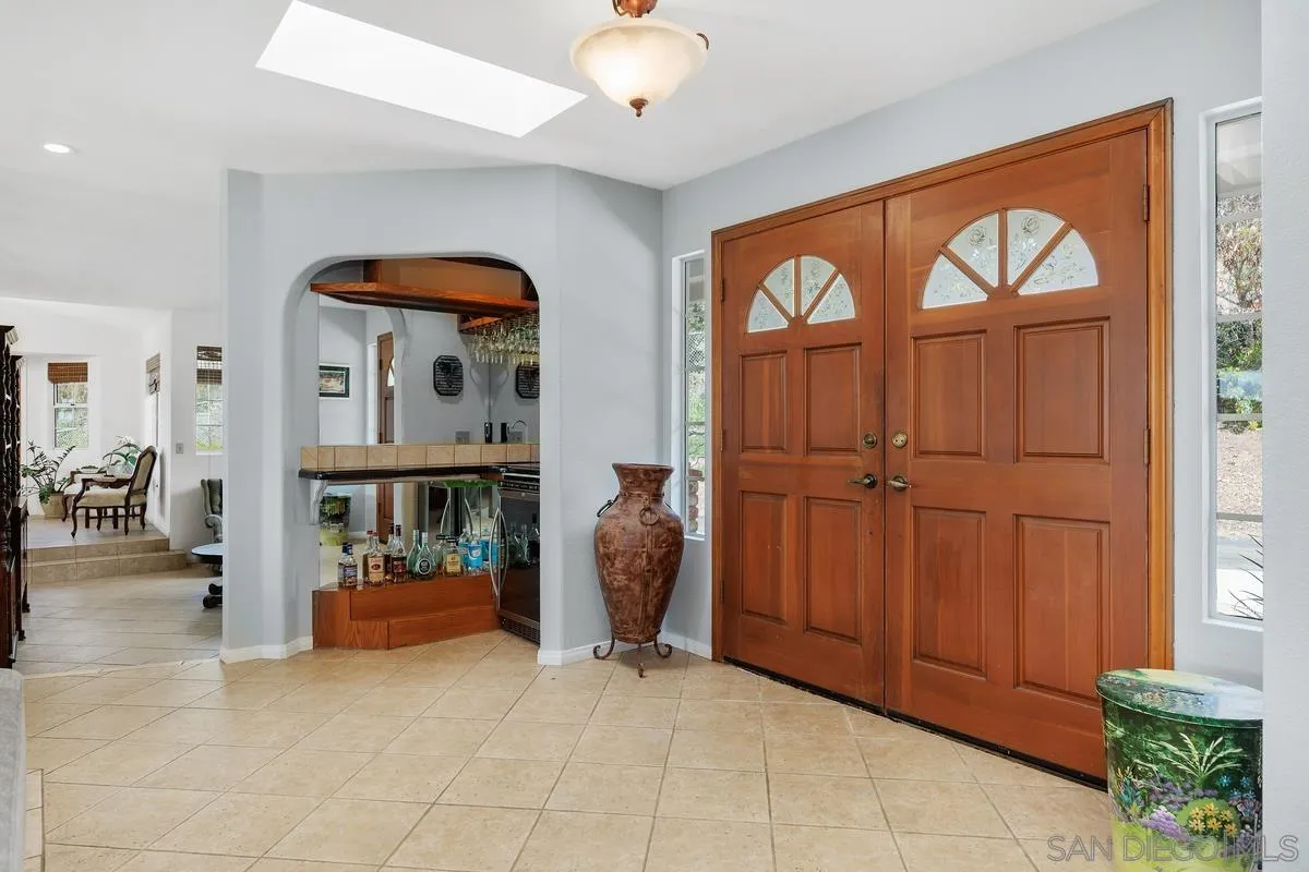 15121 Country Hill Road Poway, CA 92064 - Photo 5 of 40 a view of living room with furniture and a large window