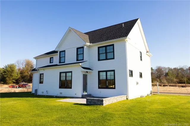 a view of a chairs and table in the garden