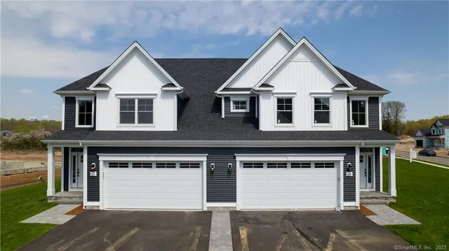 a view of a house with roof deck