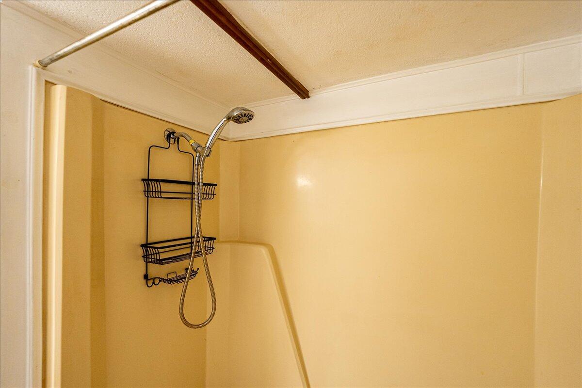 1276 Southwest Tropical Terrace Stuart, FL 34997 - Photo 18 of 27 a bathroom with a shower