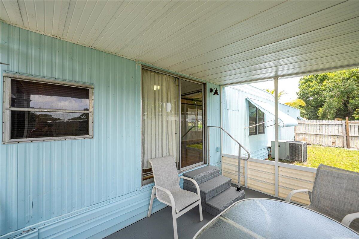 1276 Southwest Tropical Terrace Stuart, FL 34997 - Photo 19 of 27 a living room with furniture