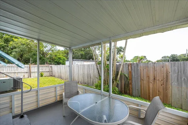 a bathroom with a tub and sink
