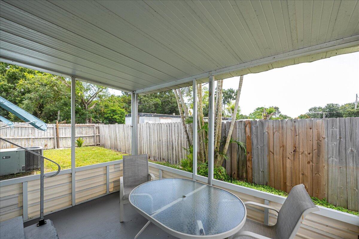 1276 Southwest Tropical Terrace Stuart, FL 34997 - Photo 20 of 27 a bathroom with a tub and sink