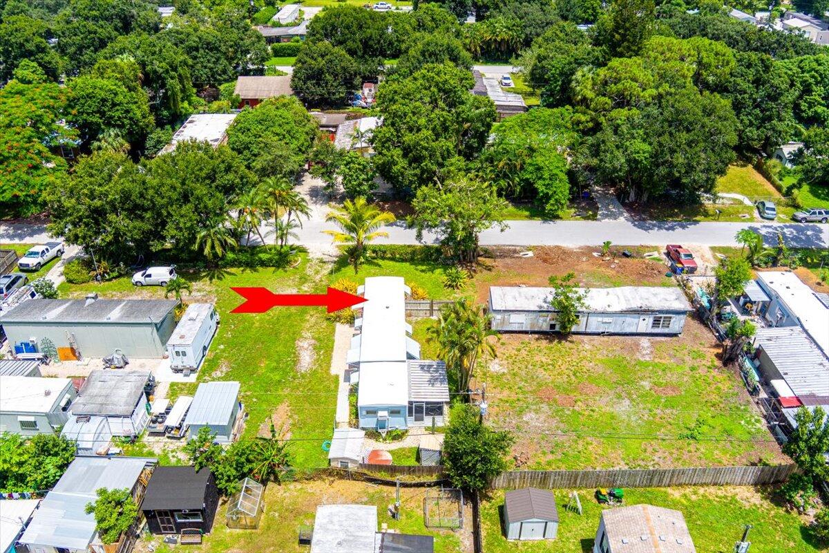 1276 Southwest Tropical Terrace Stuart, FL 34997 - Photo 2 of 27 an aerial view of swimming pool