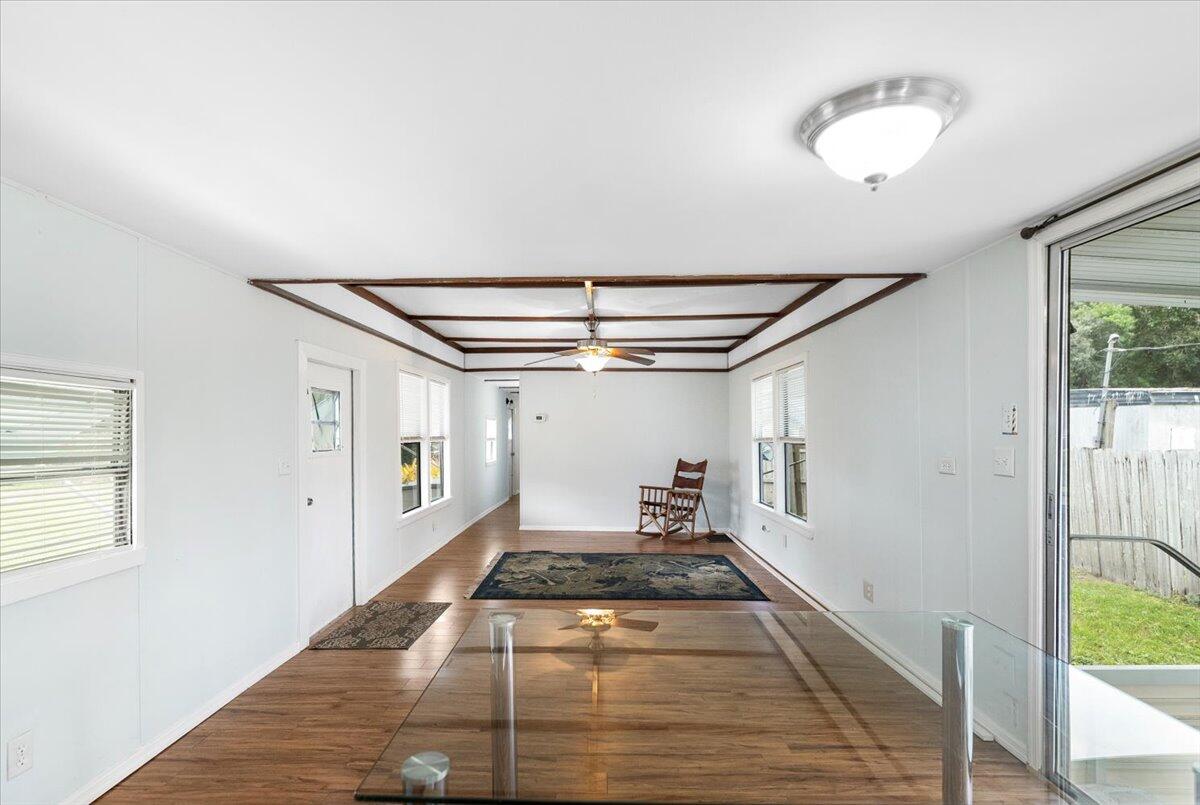 1276 Southwest Tropical Terrace Stuart, FL 34997 - Photo 9 of 27 a very nice looking room with a rug