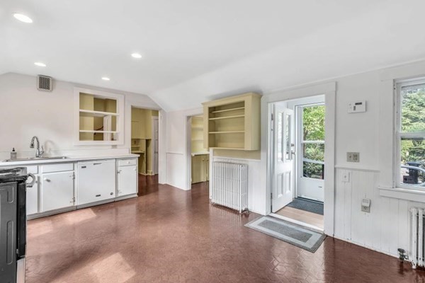 81 Fearing Road Hingham, MA 02043 - Photo 20 of 42 a large white kitchen with granite countertop a sink and dishwasher with a large window
