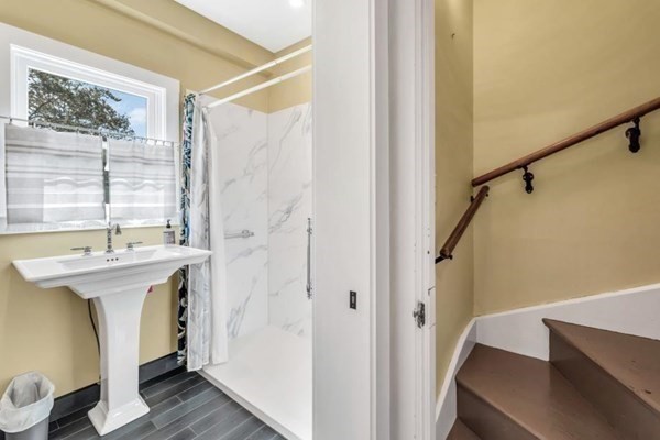 81 Fearing Road Hingham, MA 02043 - Photo 24 of 42 a bathroom with a sink and a mirror