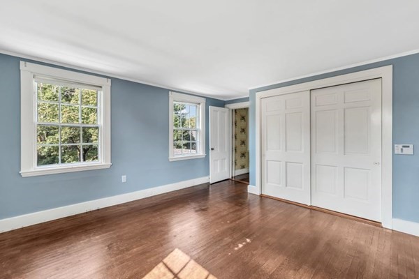 81 Fearing Road Hingham, MA 02043 - Photo 26 of 42 a view of an empty room with wooden floor and a window