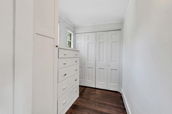 81 Fearing Road Hingham, MA 02043 - Photo 30 of 42 a view of walk in closet with wooden floor