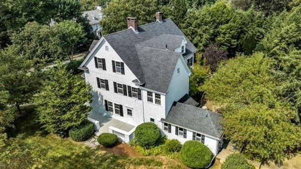 81 Fearing Road Hingham, MA 02043 - Photo 3 of 42 an aerial view of a house with a yard and large trees