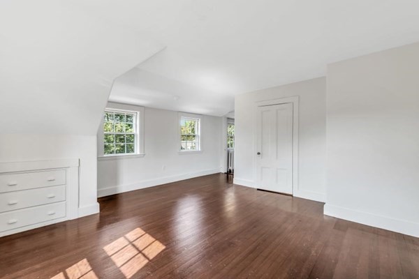 81 Fearing Road Hingham, MA 02043 - Photo 35 of 42 an empty room with wooden floor and windows